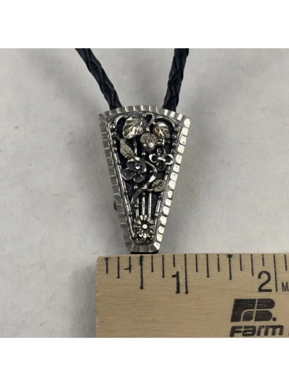 Vtg Black Hills Sterling Silver Bolo Tie Floral Silver Tips Braided Leather USA